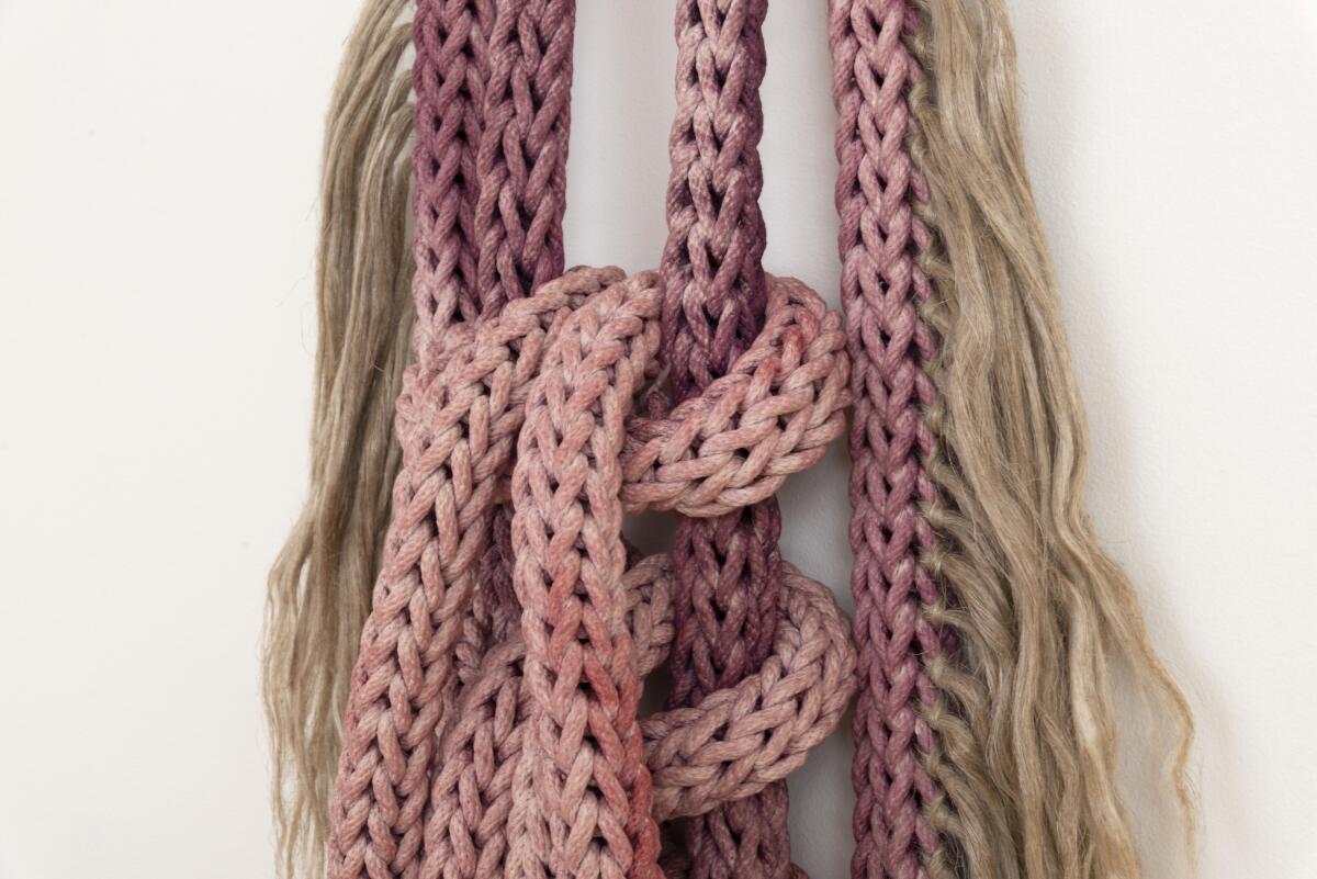 "Cosas que Sangran" by artist Tanya  Aguiñiga  consists of braided cotton rope, cochineal dye and heckled flax.