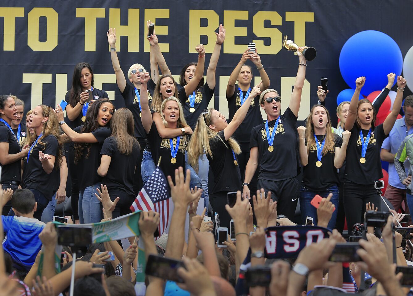 Members of the Women's World Cup championship U.S. soccer team rejoice with fans at L.A. Live in downtown Los Angeles.