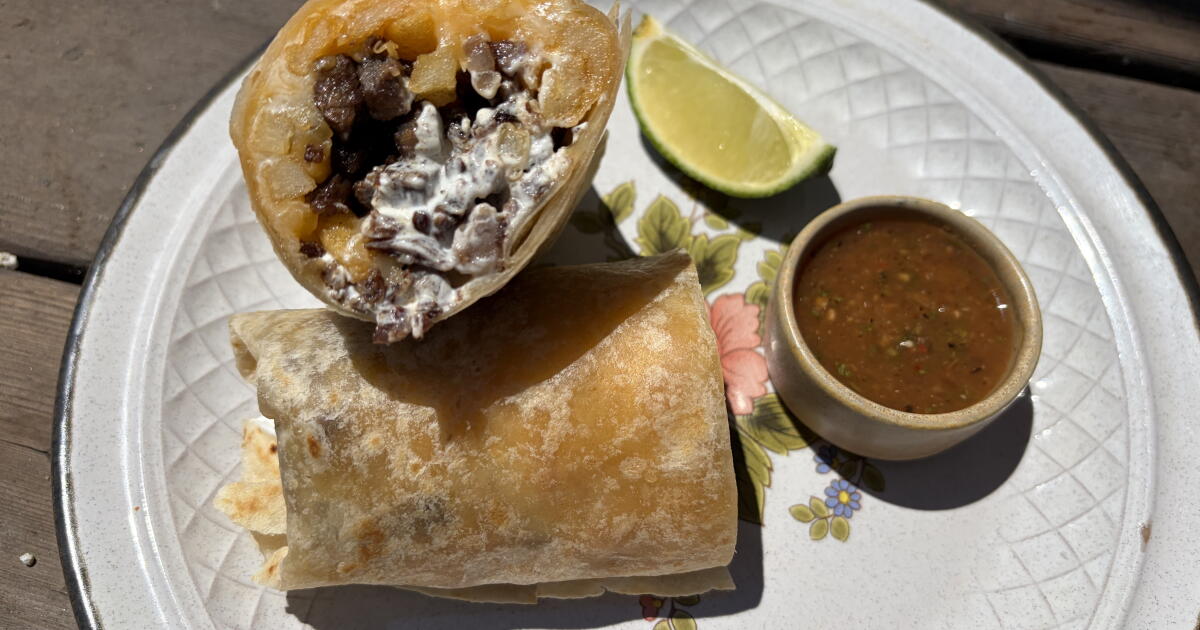 A California burrito is steak, fries, cheese and sour cream in a flour ...