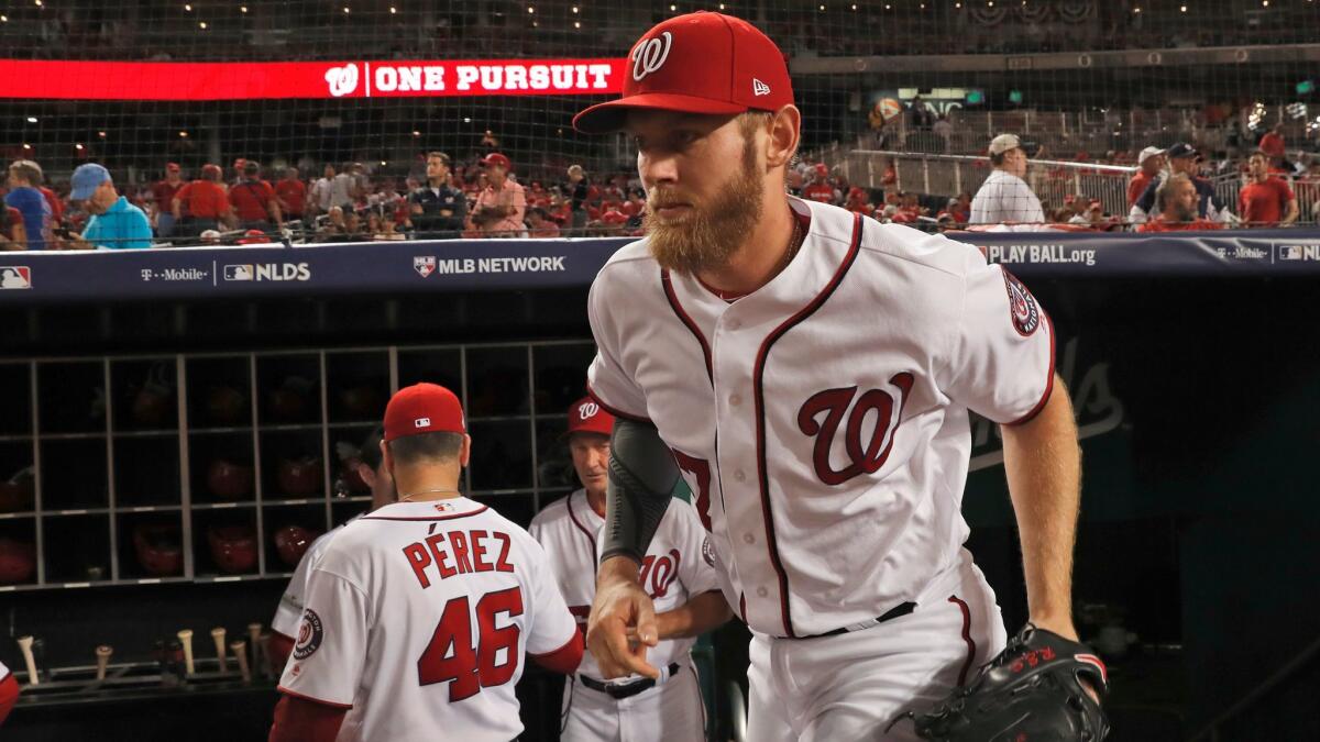 Washington Nationals pitcher Stephen Strasburg takes the field before Game 1 of the National League division series against the Chicago Cubs on Oct. 6.