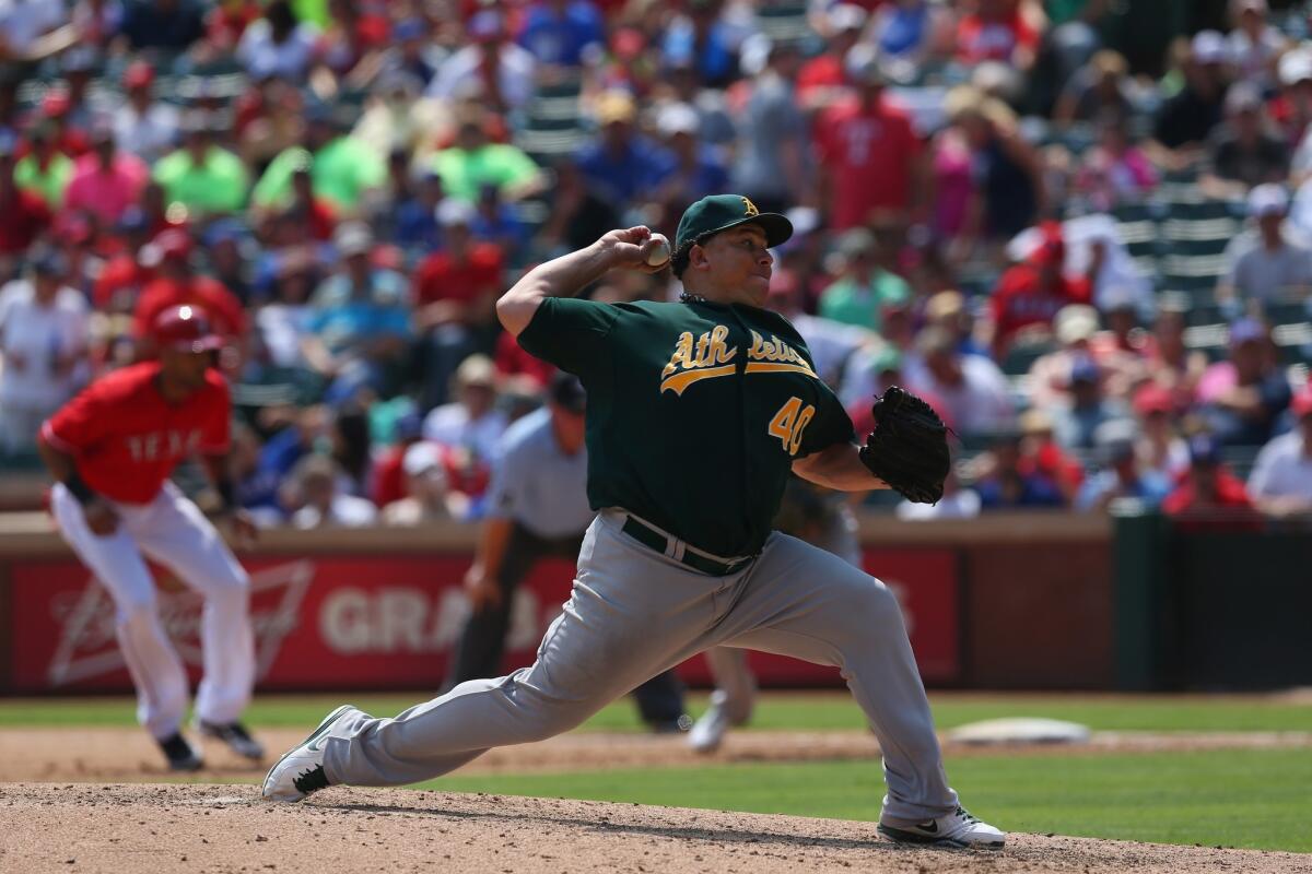 Oakland starter Bartolo Colon delivers a pitch during the sixth inning of the Athletics' 1-0 victory over the Texas Rangers on Saturday.