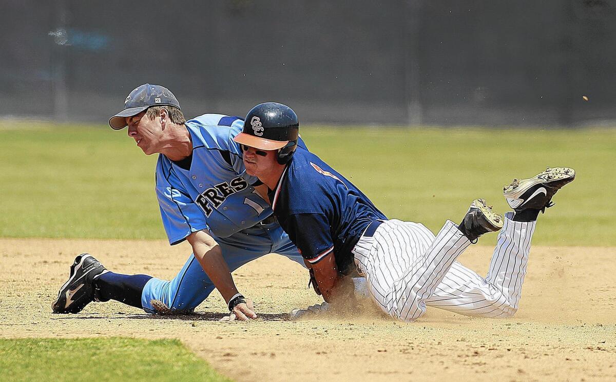 Boog Powell, right, who starred at Orange Coast College in 2012, has hit another roadblock in his pro career with a second suspension for performance-enhancing drugs.
