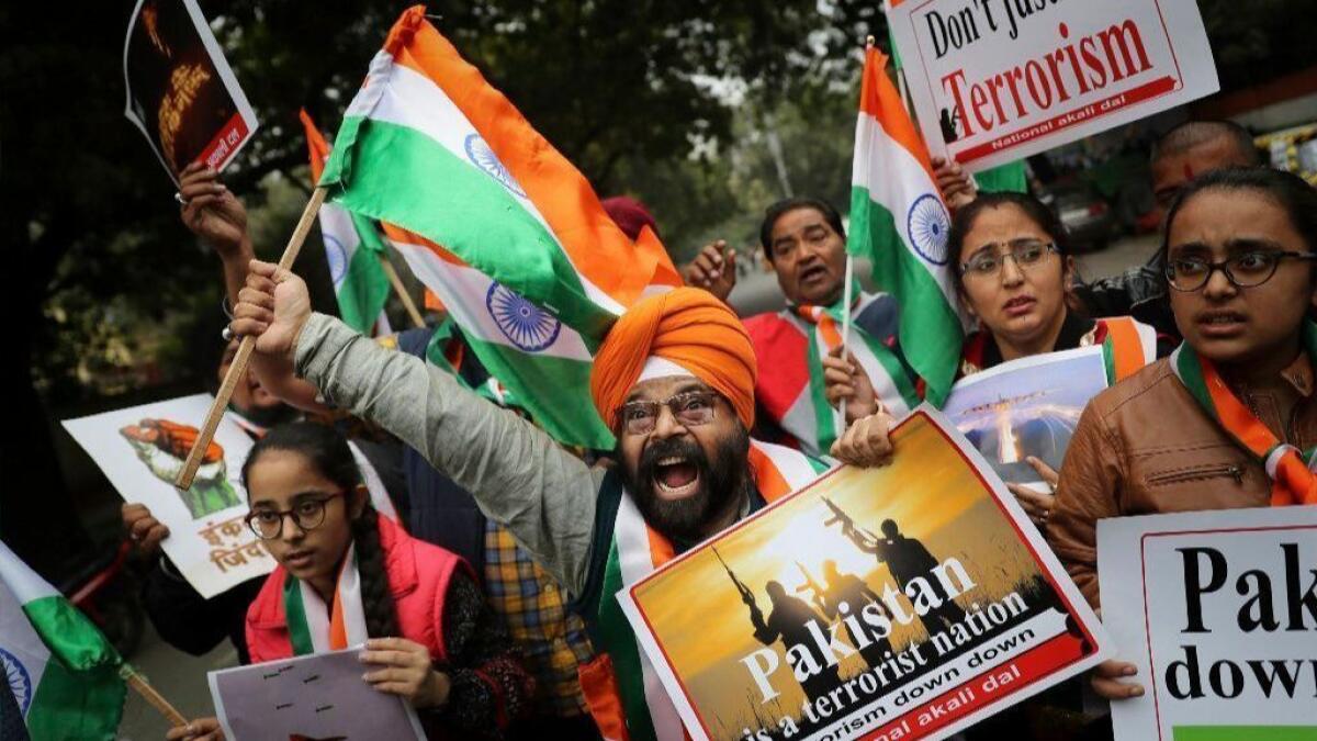 Indians shout anti-Pakistan slogans at a Feb. 26 demonstration in New Delhi following news of Indian aircraft bombing Pakistan territory.