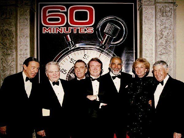 Members of the "60 Minutes" staff gather at the Metropolitan Museum of Art in New York on Nov. 10, 1993, to celebrate the newsmagazine's 25th anniversary. From left are: Mike Wallace, Andy Rooney, Morley Safer, Steve Kroft, Ed Bradley, Leslie Stahl and the show's executive producer, Don Hewitt.