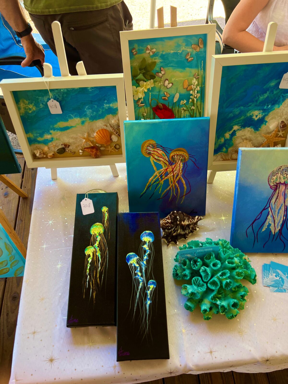 Paintings by Anna Stone at Saturday's Artisan Market.