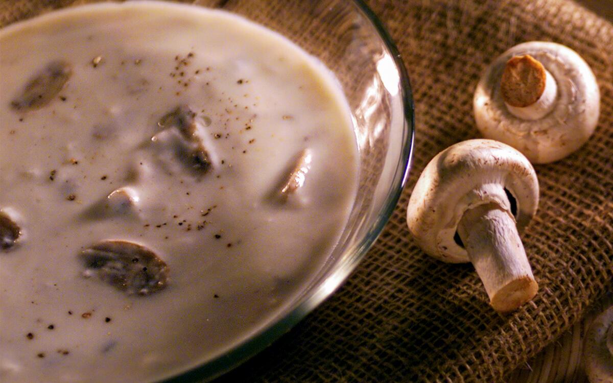 Cream of mushroom soup. cutting board from Crate and Barrel.