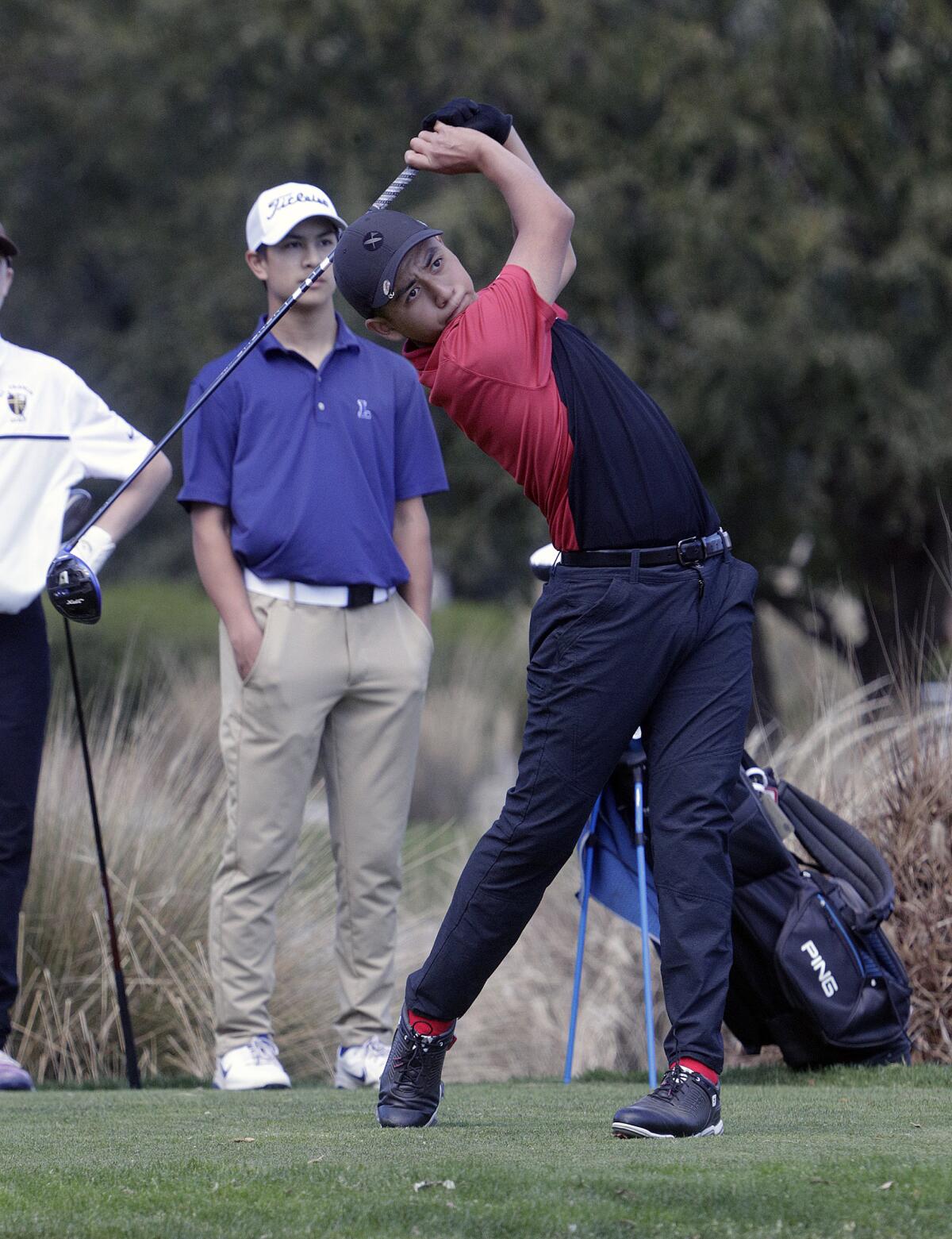 Burroughs High's Emilio Huerta tees off in the third annual Oakmont Invitational at Oakmont Country Club on Monday.