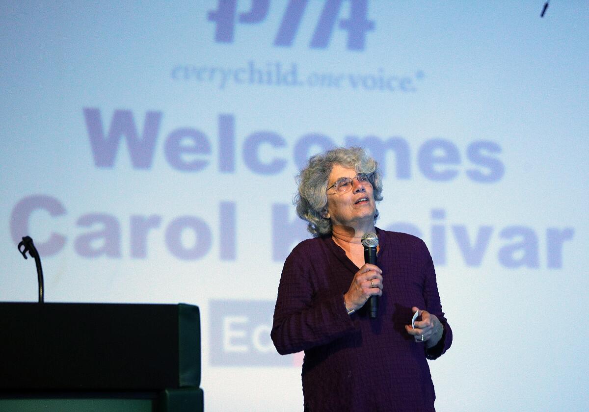 Carol Kocivar speaks during a Community Engagement Night, hosted by the Burbank Council Parent Teacher Assn., at Luther Burbank Middle School on Wednesday.