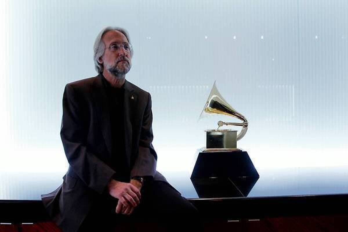 Recording Academy President Neil Portnow says that the Grammy rule changes, announced in 2011, were critical because the number of trophies had ballooned unreasonably.