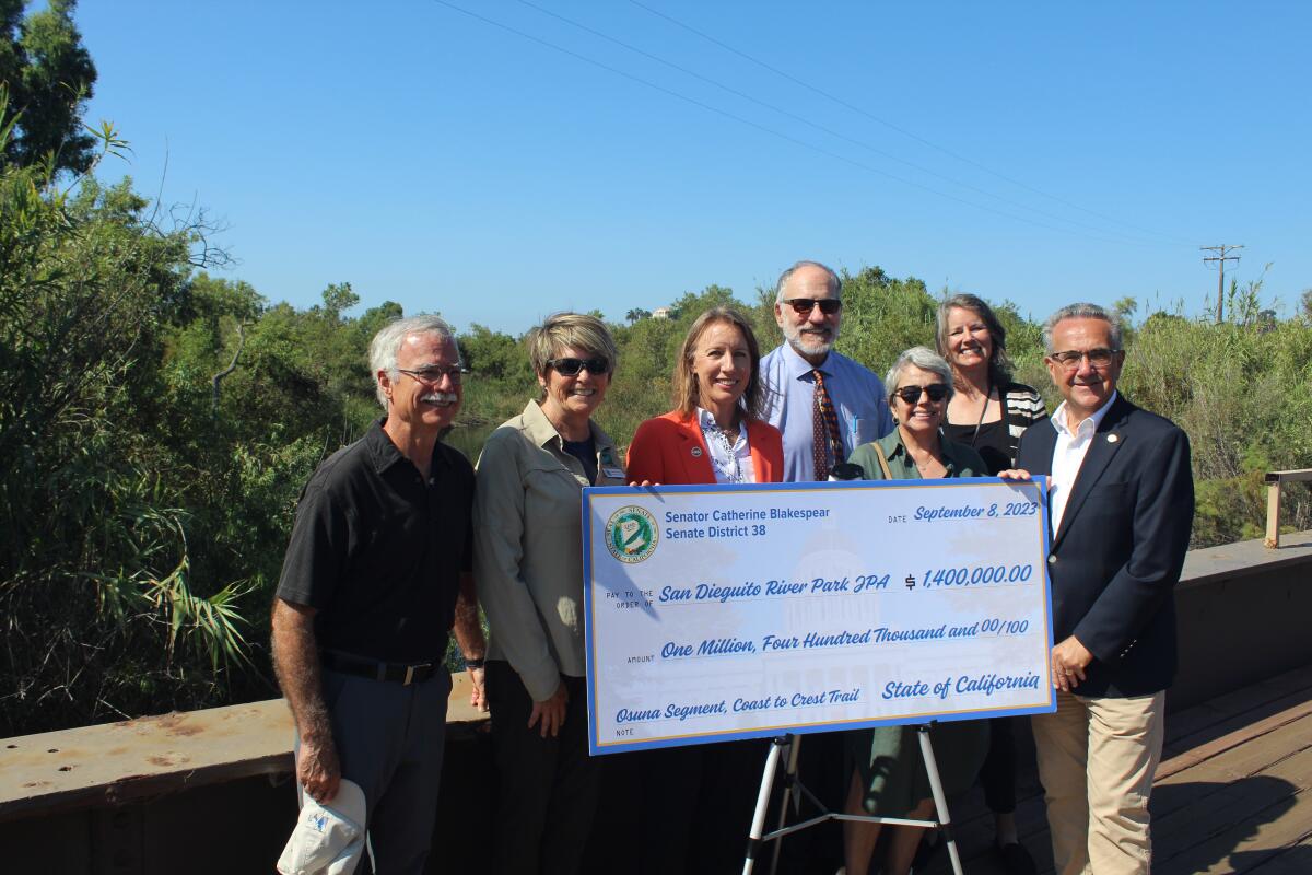 Local leaders celebrated state funding to complete the 1-mile Osuna Segment of the Coast to Crest Trail.