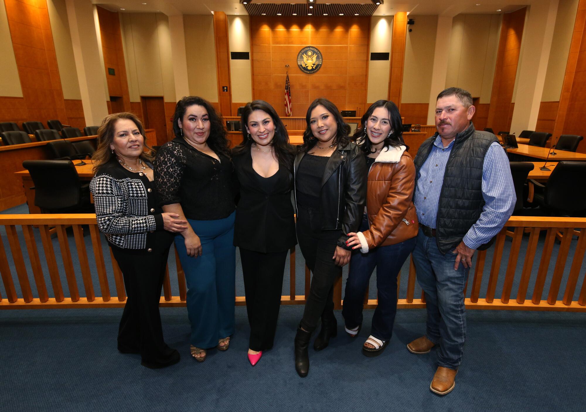 From left to right, Vilma Nunez and daughters, Karen Callejas, Jessenia, Jennifer, Lisset and husband, Rafael before a swear