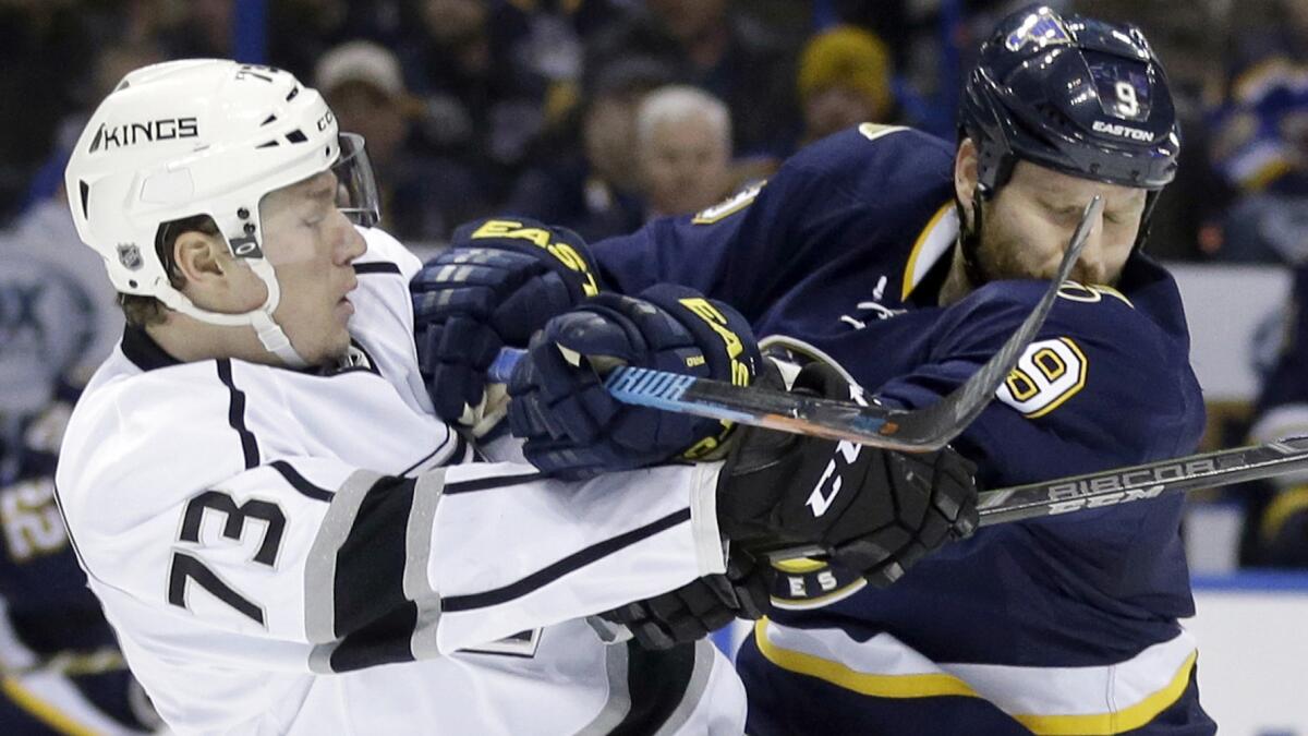 St. Louis Blues forward Steve Ott, right, checks Kings forward Tyler Toffoli during the second period of the Kings' 5-2 loss Tuesday.