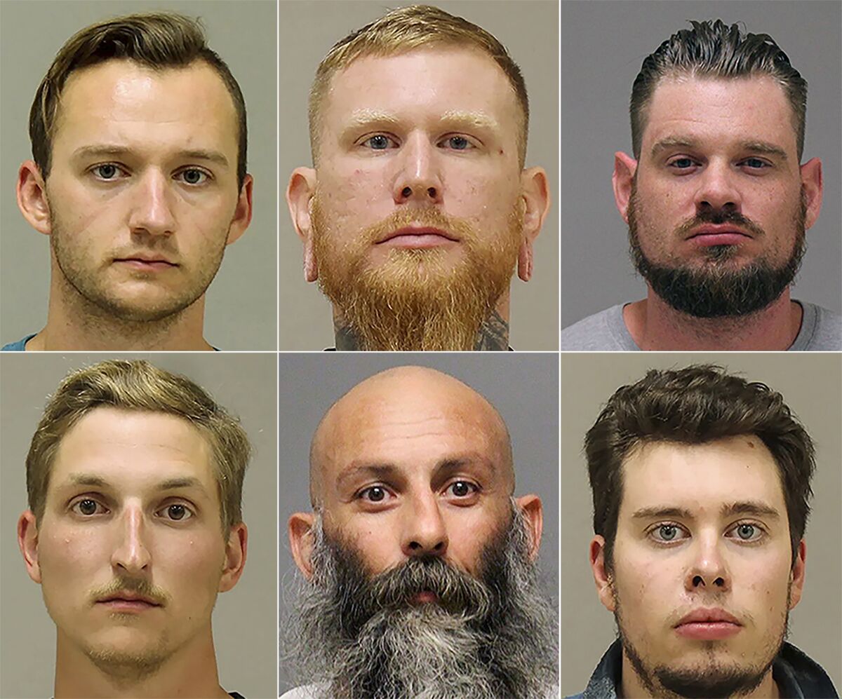 FILE - This photo combo shows from top left, Kaleb Franks, Brandon Caserta, Adam Dean Fox, and bottom left, Daniel Harris, Barry Croft, and Ty Garbin. A federal judge on Friday, Sept. 17, 2021, said he would postpone the Oct. 12 trial of five men accused of planning to kidnap Michigan Gov. Gretchen Whitmer. A new date wasn't immediately set, but U.S. District Judge Robert Jonker suggested the trial might get pushed to February or March. A sixth man, Ty Garbin, pleaded guilty and was recently sentenced to slightly more than six years in prison. He's expected to be a major witness for the government at trial. (Kent County Sheriff via AP File)
