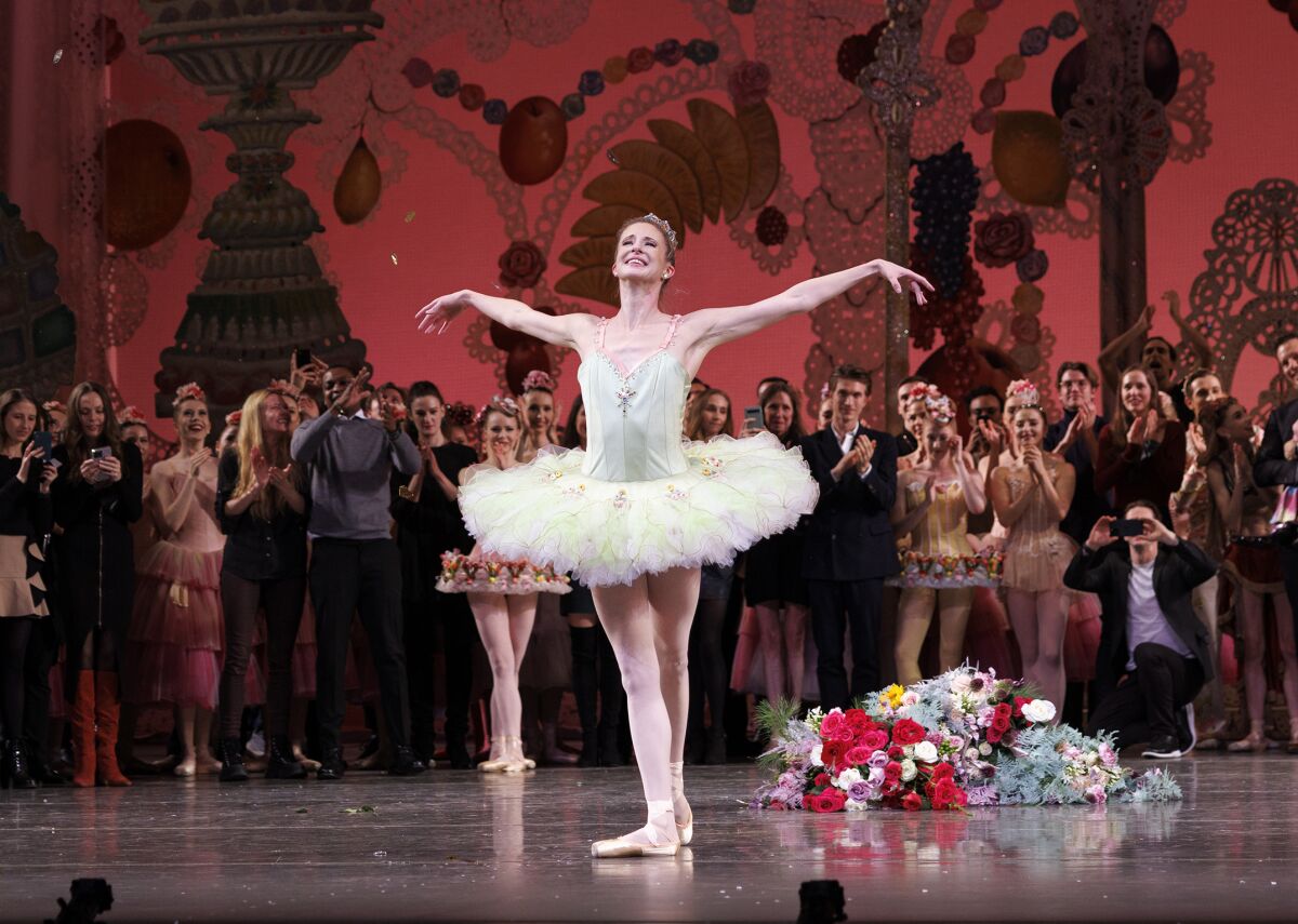 This image released by the New York City Ballet shows principal dancer Sterling Hyltin taking her final bow with New York City Ballet after performing as the Sugarplum Fairy in George Balanchine's "The Nutcracker," in New York on Dec. 4, 2022. (Erin Baiano/New York City Ballet via AP)