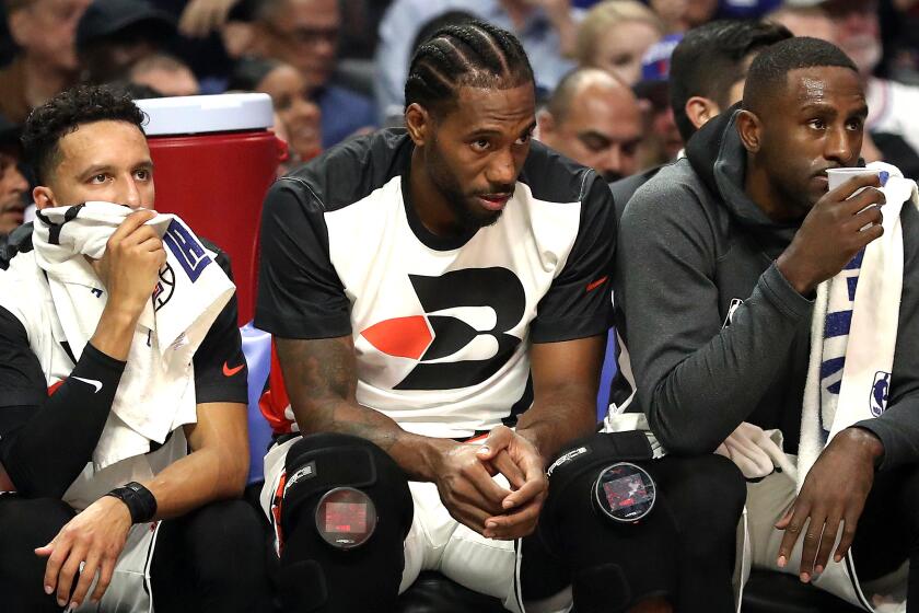 LOS ANGELES, CALIFORNIA - NOVEMBER 07: Kawhi Leonard #2 of the Los Angeles Clippers sits on the bench during the first half of a game against the Portland Trail Blazers at Staples Center on November 07, 2019 in Los Angeles, California. NOTE TO USER: User expressly acknowledges and agrees that, by downloading and/or using this photograph, user is consenting to the terms and conditions of the Getty Images License Agreement (Photo by Sean M. Haffey/Getty Images)