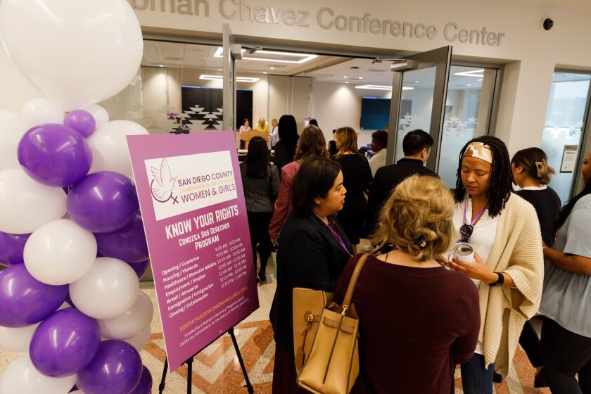 Attendees mingle before the start of the Know Your Rights Symposium at the Southeastern Live Well Center on Saturday, March 9, 2024. The event, hosted by the Commission of the Status of Women and Girls, consisted of panel discussions on employment, housing, healthcare and immigration.