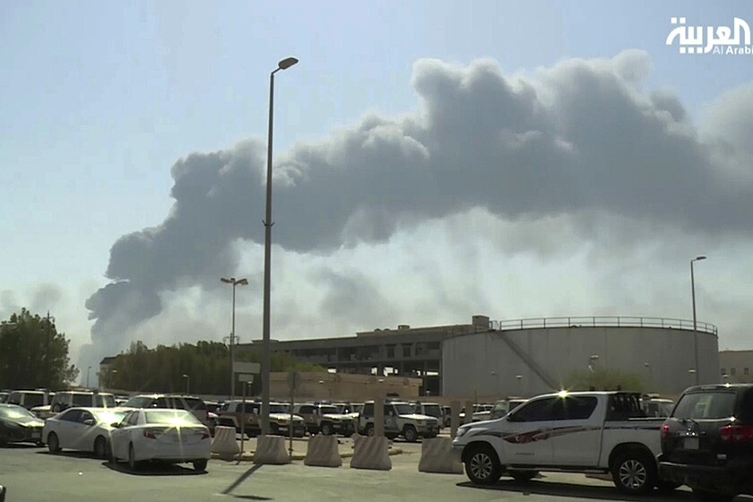 A photo taken from a video broadcast on the Saudi-owned satellite news channel Al-Arabiya shows smoke from a fire at the Abqaiq oil processing facility in Buqayq, Saudi Arabia.