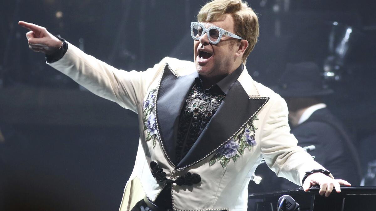 Elton John Is Not the Man They Think He Is at Home