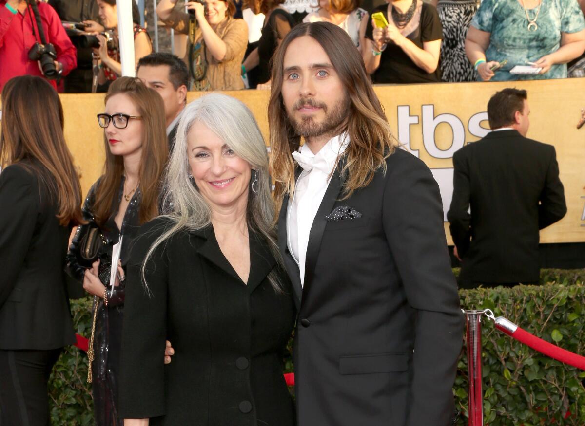 "Dallas Buyers Club" actor Jared Leto won the supporting role award at SAG, which he attended with his mother Constance.