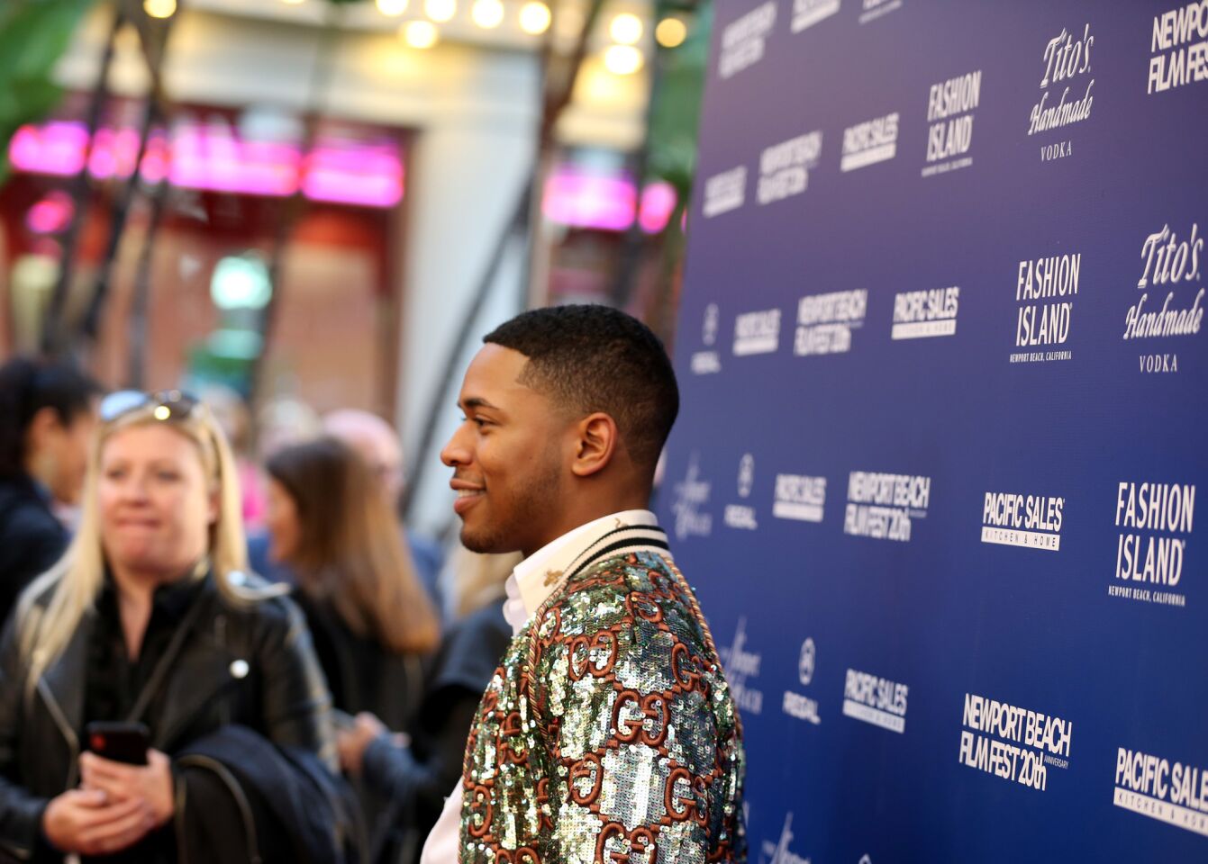The star of “Luce,” Kelvin Harrison Jr., stands on the red carpet at the opening night of the Newport Film Festival.