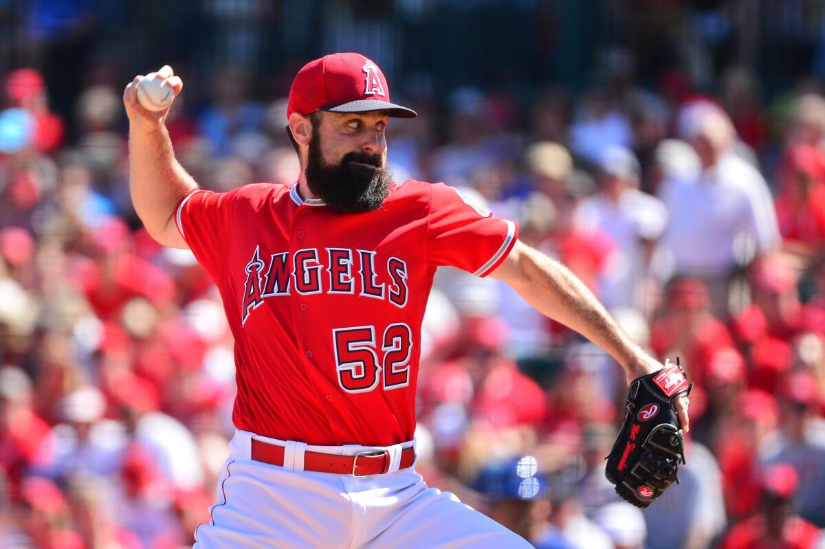 Angels starting pitcher Matt Shoemaker delivers a pitch in the first inning against the Rangers during a spring training game on Sunday.