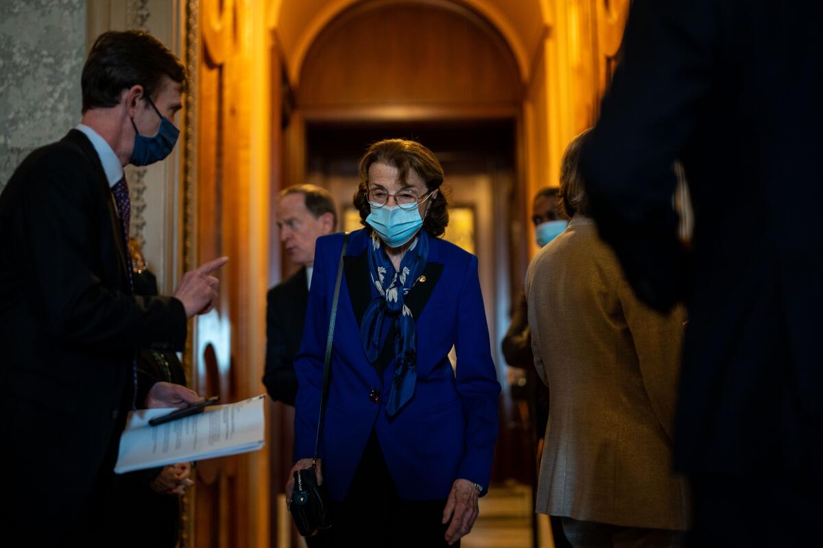 Sen. Dianne Feinstein leaves the Senate chamber in the U.S. Capitol.
