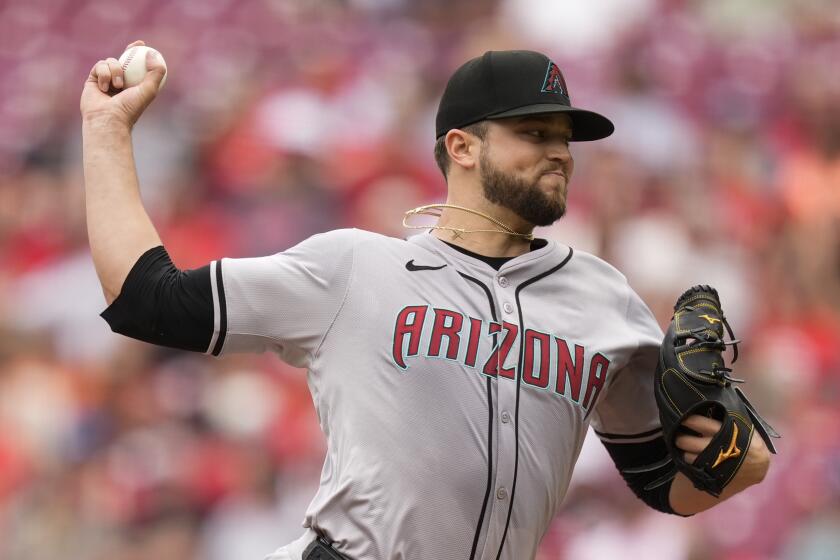 Arizona Diamondbacks starting pitcher Slade Cecconi throws in the first inning of a baseball game against the Cincinnati Reds on Thursday, May 9, 2024, in Cincinnati. (AP Photo/Carolyn Kaster)