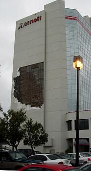 Wind from Hurricane Frances ripped part of the facade off the Marriott Hotel in downtown Orlando about 6:30 Sunday morning. Guests were initially evacuated to a second-floor ballroom but after an hour were allowed to return to their rooms.