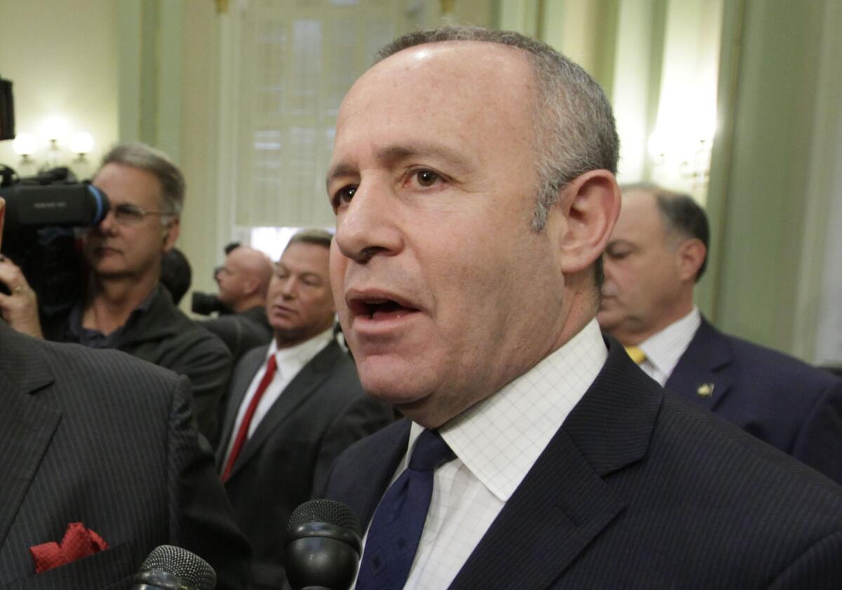 State Sen. President Pro Tem Darrell Steinberg, D-Sacramento, talks to reporters following Gov. Jerry Brown's 2014 State of the State address. Steinberg introduced a bill Friday to serve as a vehicle for a legislative compromise on California's medical malpractice law.