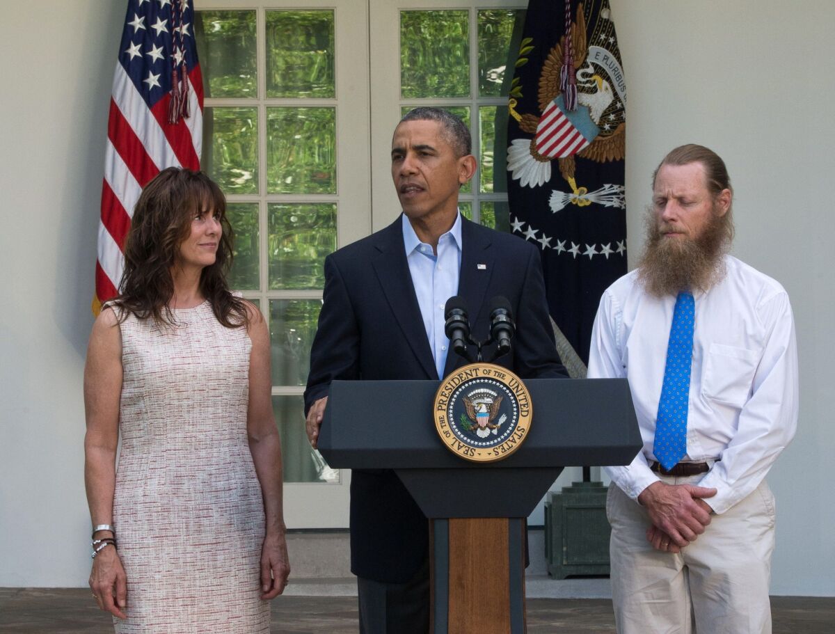 The parents of Sgt. Bowe Bergdahl stand alongside President Obama makes a statement regarding the release of their son.