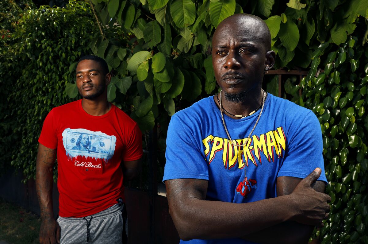 Joshua McKinney, 26, left, and Eric Hunt, 41, are former inmate firefighters who want to go back to fighting fires.