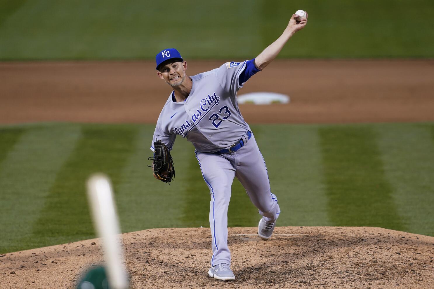 Singer pitches into sixth, Royals beat Rockies to avoid sweep