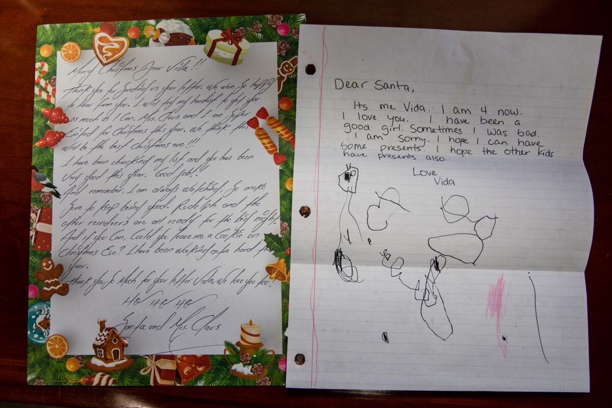 A response written by one of San Diego Rescue Mission’s residential program participants next to the child’s letter to Santa.
