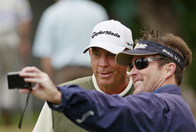John Kelly, right, takes a picture of he and Tom Lehman during the pro-am at the Toshiba Classic on Thursday.