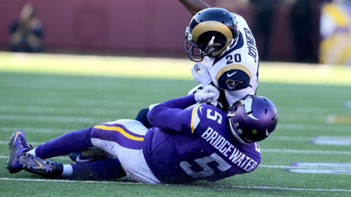 Rams cornerback Lamarcus Joyner hits a sliding Vikings quarterback Teddy Bridgewater during a game on Nov. 8.