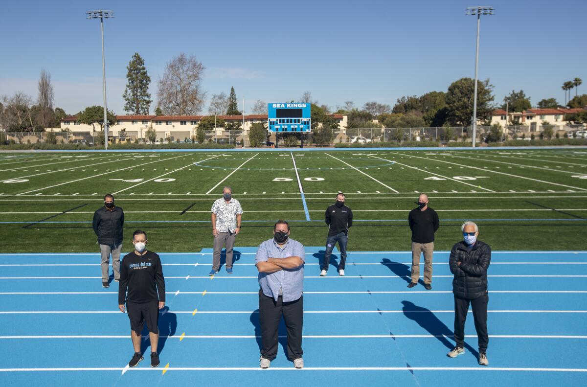 Corona del Mar coaches and staff Jeff Perry,