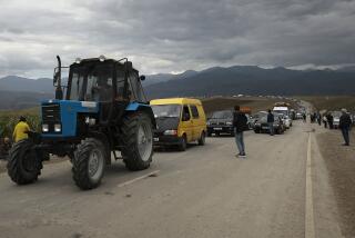 A convoy of cars of ethnic Armenians from Nagorno-Karabakh move to Kornidzor in Syunik region, Armenia, Tuesday, Sept. 26, 2023. Thousands of Armenians have streamed out of Nagorno-Karabakh after the Azerbaijani military reclaimed full control of the breakaway region last week. (AP Photo/Vasily Krestyaninov)