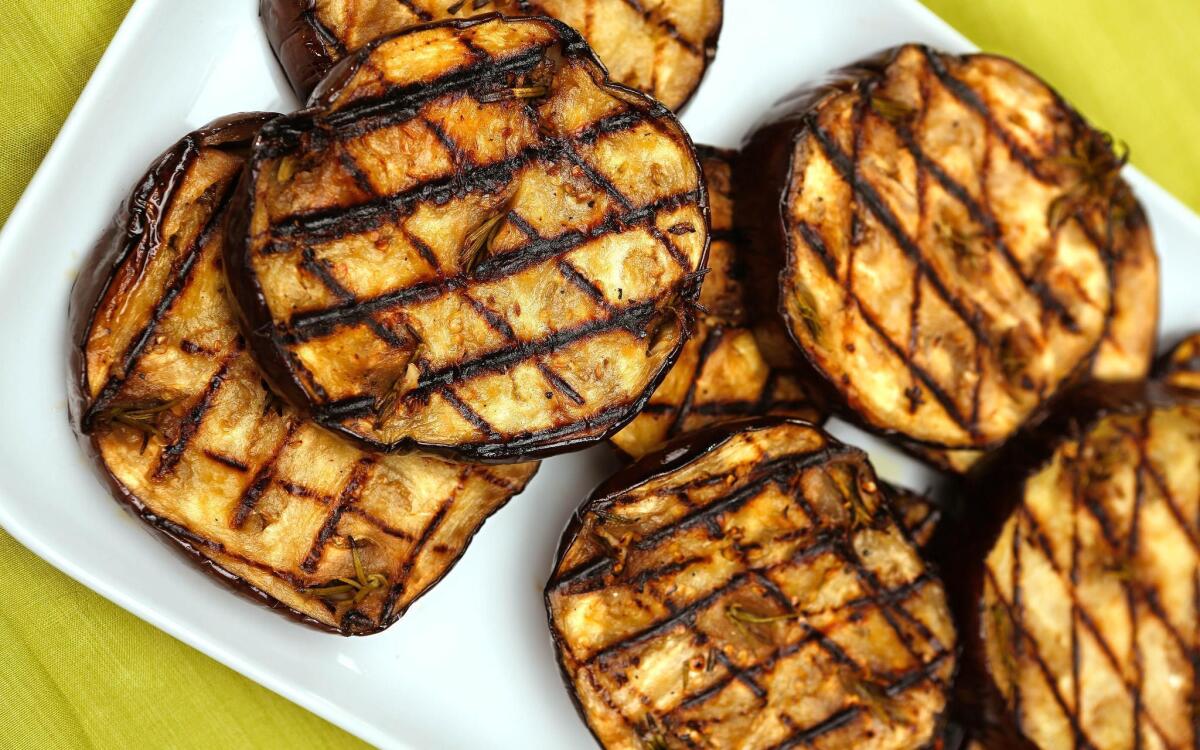 Grilled eggplant with anchovies, garlic and rosemary