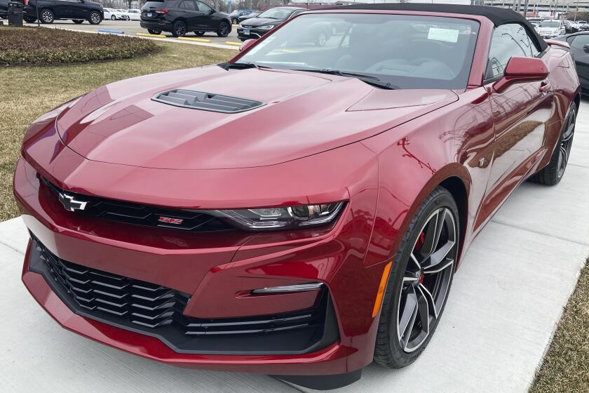 A 2023 Chevy Camaro 2SS Convertible is seen at a Chevy dealership in Wheeling, Ill., Wednesday, March 22, 2023. Strong sales in the U.S. helped General Motors increase its first-quarter net profit 19% over a year ago. (AP Photo/Nam Y. Huh)