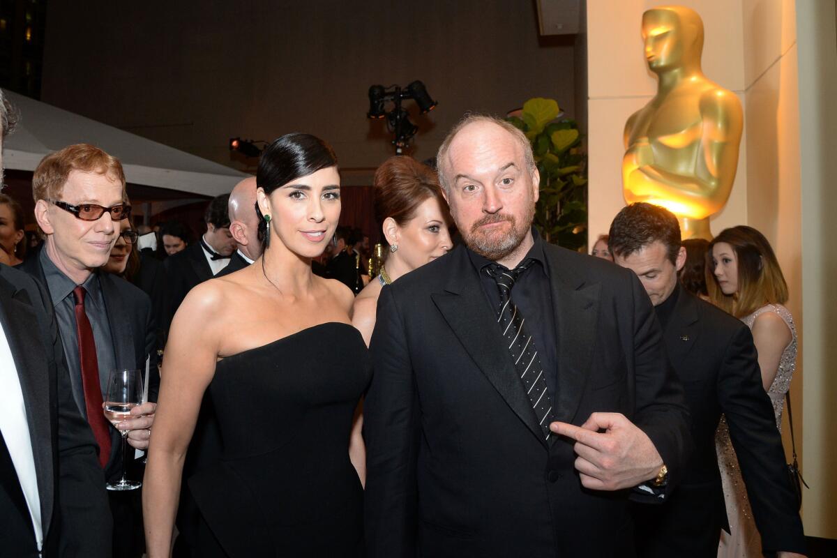 Sarah Silverman, pictured here with old friend Louis C.K. in 2016, came under fire this week for an unsavory anecdote from the pair's past.