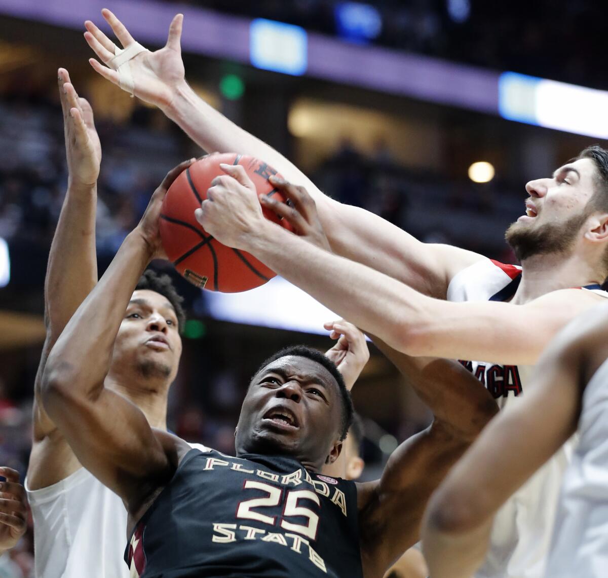 Florida State's forward Mfiondo Kabrngele gets hemmed in by the Gonzaga's defense in the first half.