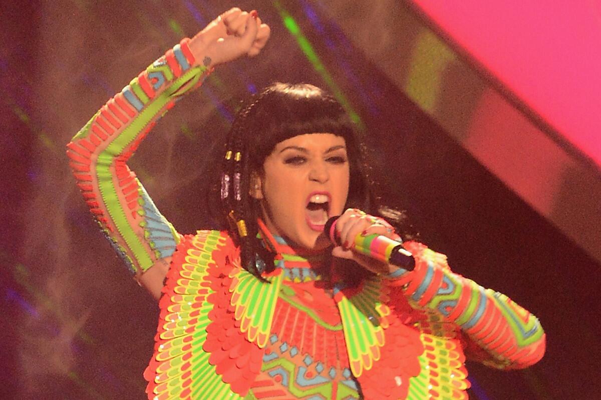 Katy Perry, shown onstage at the 2014 Brit Awards in London,tweeted Wednesday that she helped deliver a baby.