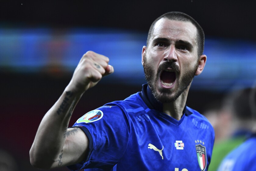 Italy's Leonardo Bonucci celebrates end of the Euro 2020 soccer championship round of 16 match between Italy and Austria at Wembley stadium in London in London, Saturday, June 26, 2021. (Ben Stansall/Pool Photo via AP)