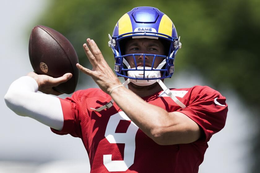 Los Angeles Rams quarterback Matthew Stafford throws a pass.