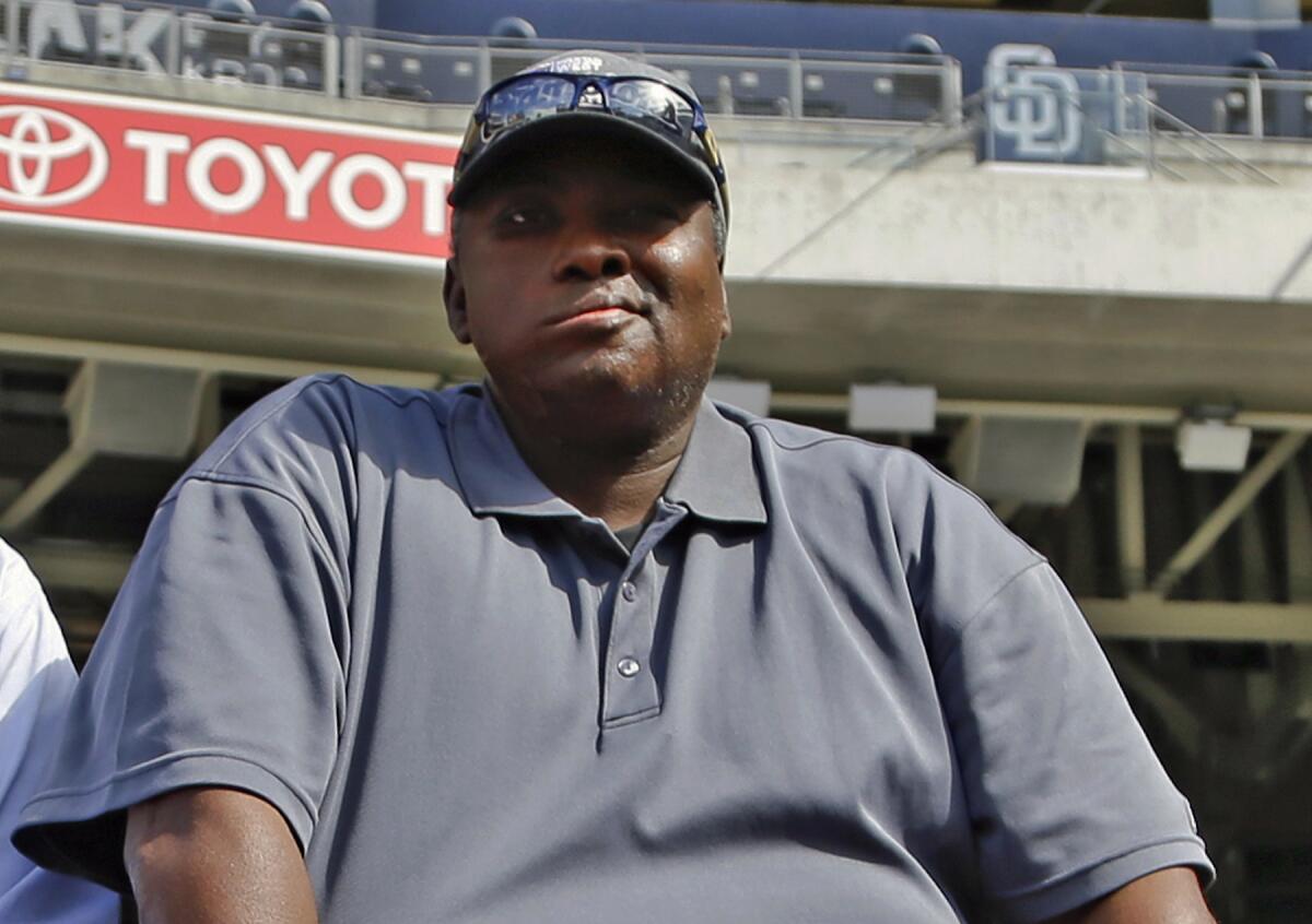 Tony Gwynn watches San Diego Padres batting practice in 2013. The former MLB star died in 2014 of cancer caused by smokeless tobacco.