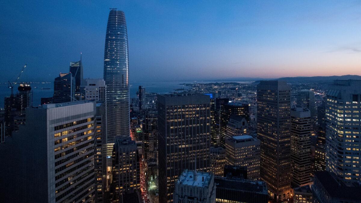 As seen from a neighboring building, the new Salesforce Tower dominates the skyline in downtown San Francisco.