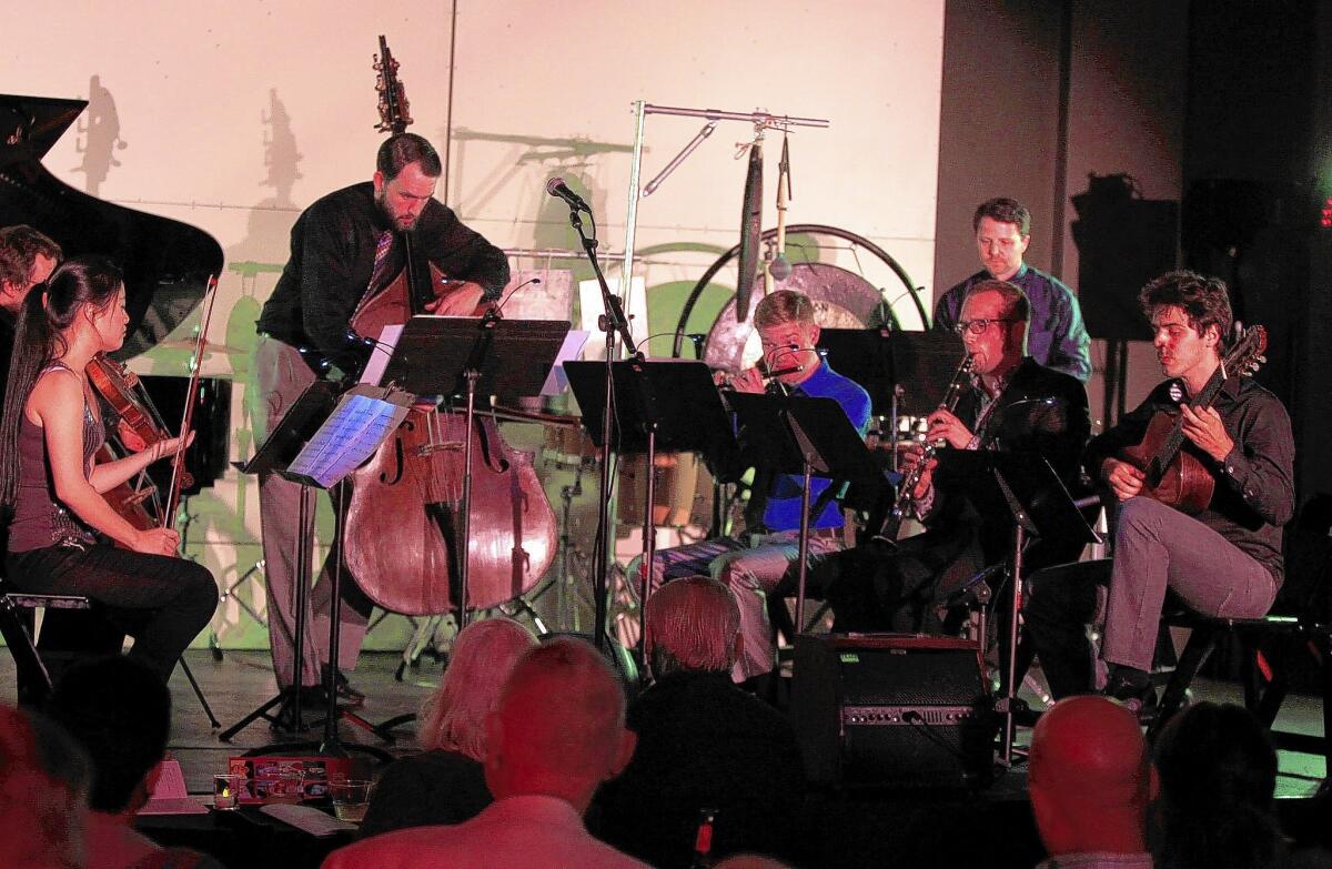 The DC8 contemporary music ensemble performs at the Farmers & Merchants Bank in downtown Los Angeles on May 6, 2014.