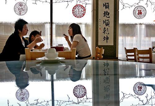 Left to right: Heyan Zhang, Yingqi Xu and Ruth Wei, of Monterey Park, dine at Beijing Restaurant in San Gabriel.