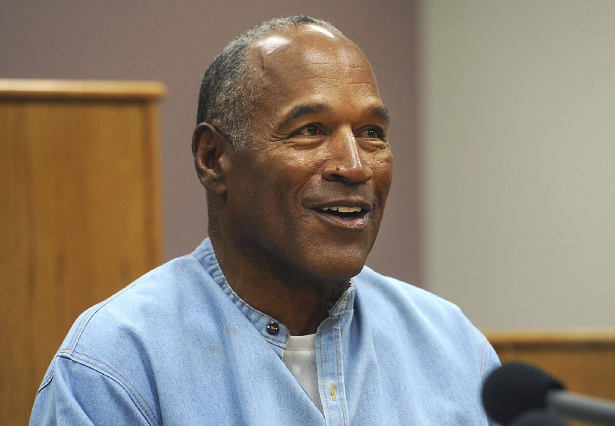 O.J. Simpson, smiling at his parole hearing in 2017