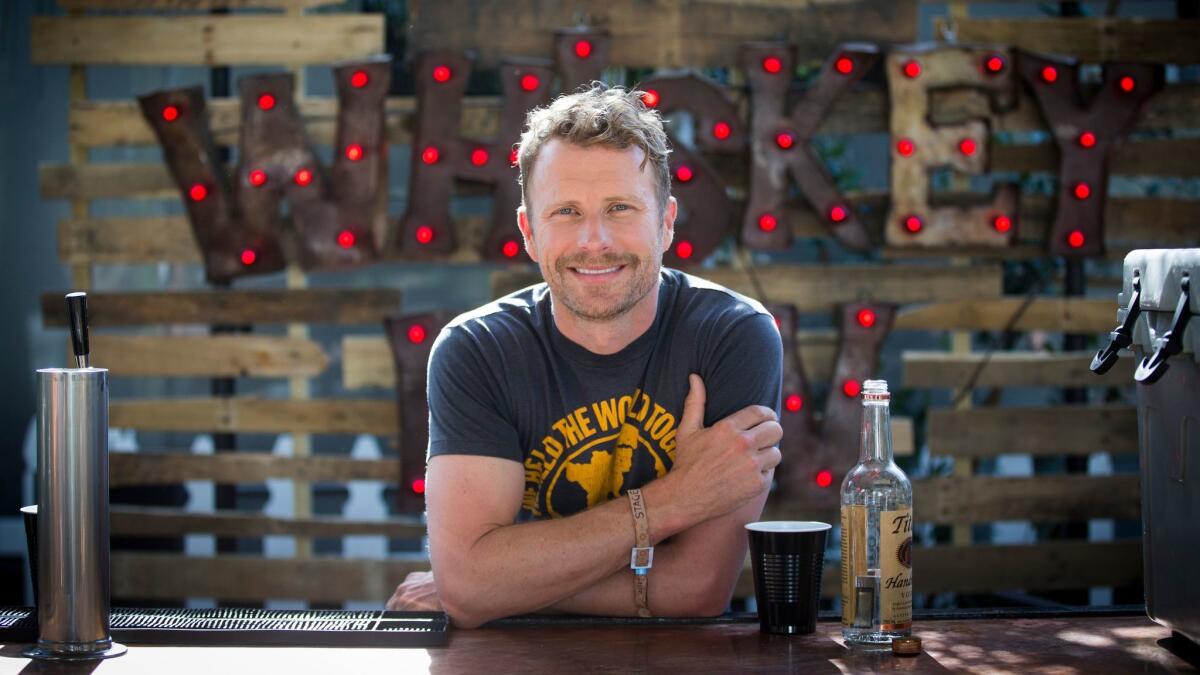 Country singer-songwriter Dierks Bentley hangs out at the Whiskey Bar he takes on tour with him before his headlining set Friday at the Stagecoach country music festival in Indio.